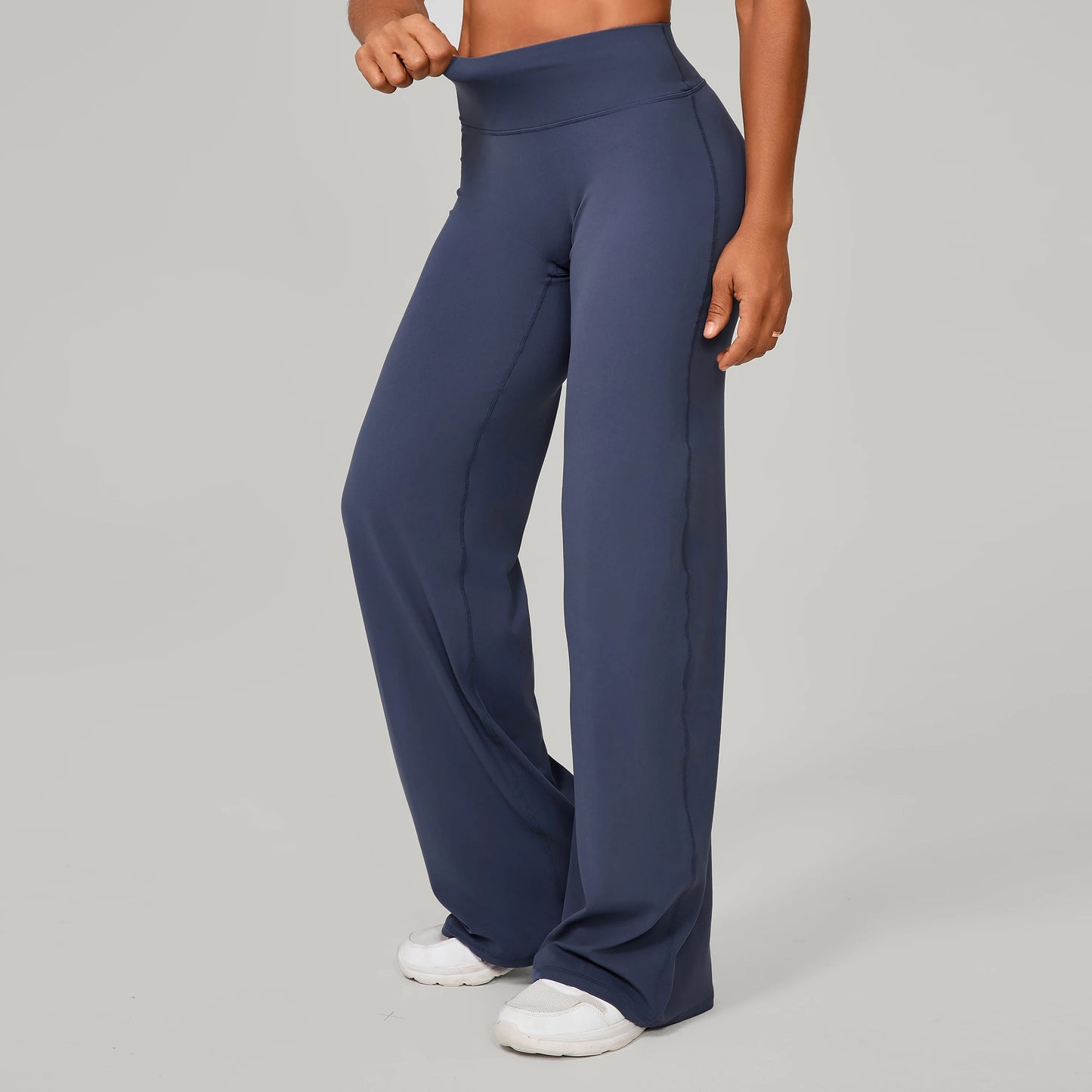 "Strait" sports pants with sweat-wicking properties.