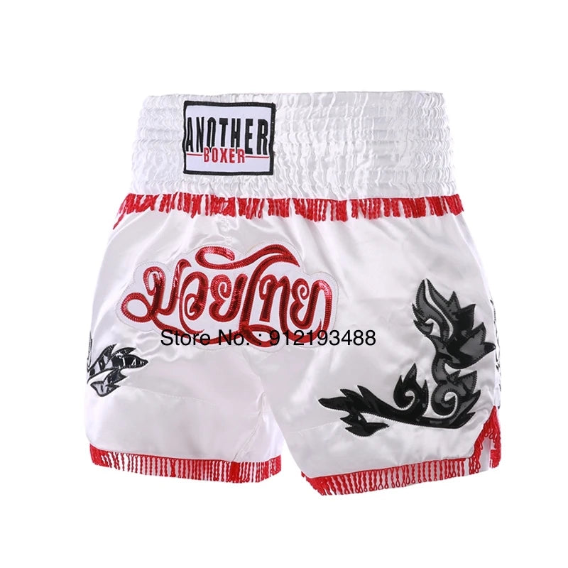 Muay Thai shorts (unisex and children's) with professional embroidery for combat training.
