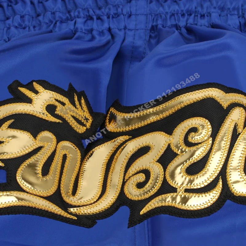 Muay Thai shorts (unisex and children's) with professional embroidery for combat training.